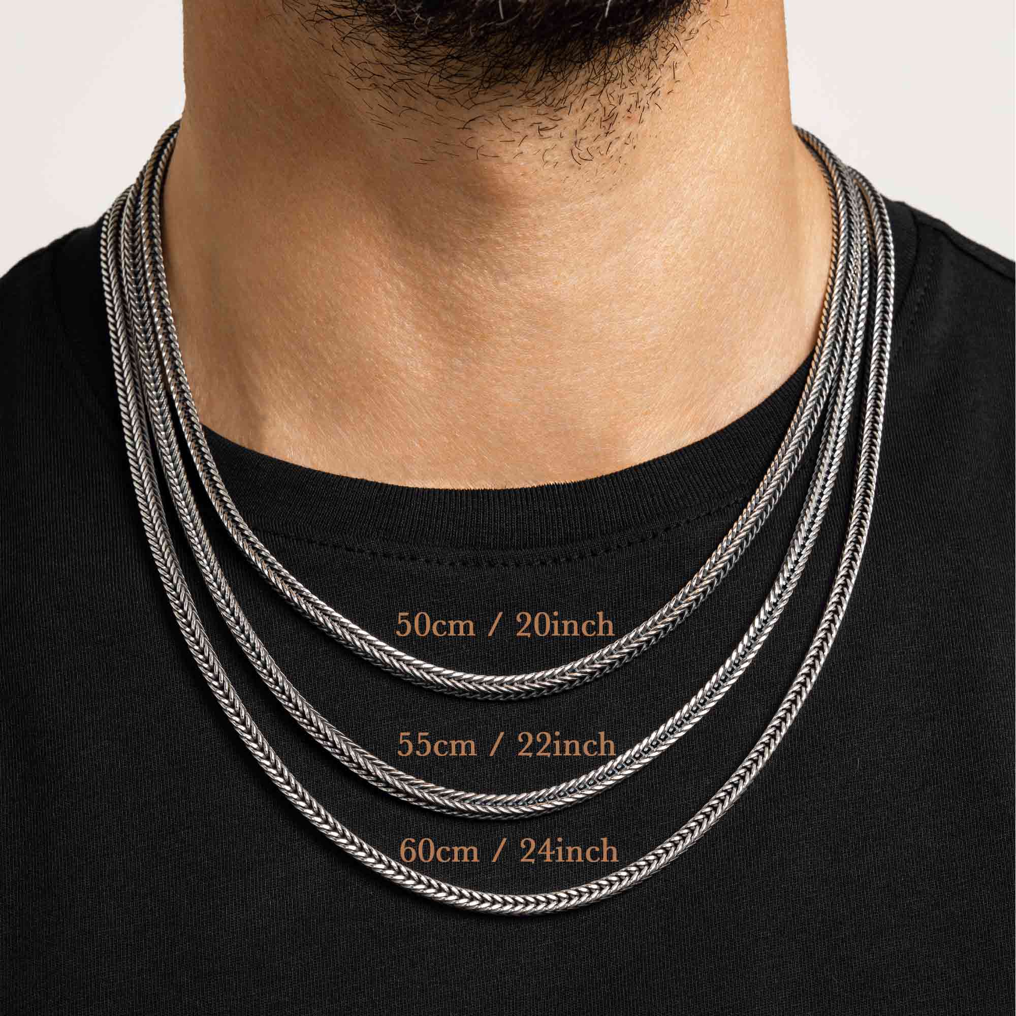 Ronatelli necklace chain length guide showing 50cm, 55cm and 60cm on model